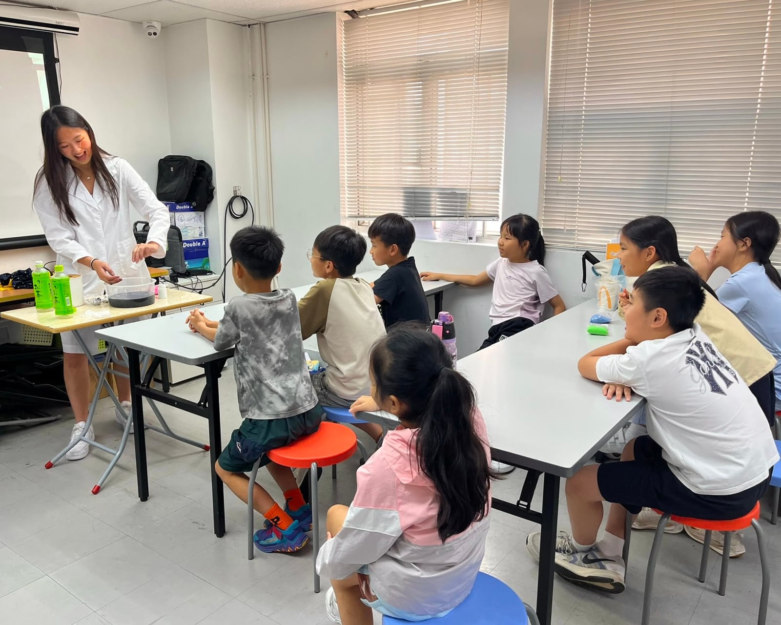 Sonia Shum leads a science-and-magic workshop for children during the Asia workshop series.